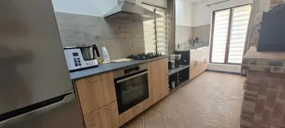 Cuisine ou kitchenette dans l'établissement Chez Philippe et Agnès Appartement T2
