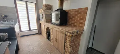 Cuisine ou kitchenette dans l'établissement Chez Philippe et Agnès Appartement T2