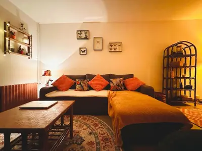 Un ou plusieurs lits dans un hébergement de l'établissement Maison Cosy & son jardin