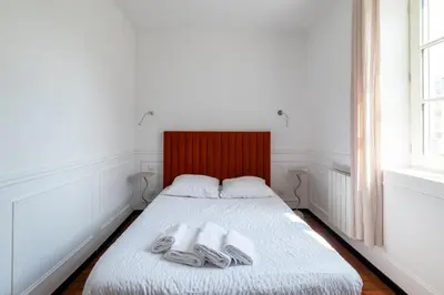 Un ou plusieurs lits dans un hébergement de l'établissement Reims Cathédrale Hyper Centre
