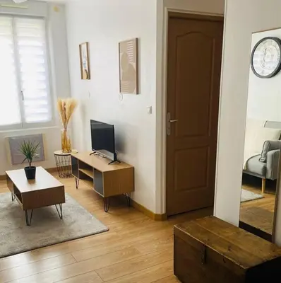 Télévision ou salle de divertissement dans l'établissement Chez Mischa