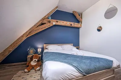 Un ou plusieurs lits dans un hébergement de l'établissement Magnifique maison de ville - parking - proche Disney