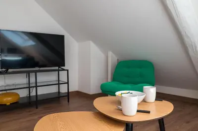 Télévision ou salle de divertissement dans l'établissement Reims Hyper Centre Cathédrale