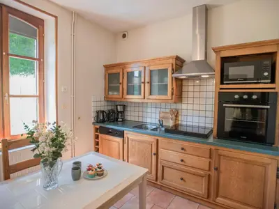 Cuisine ou kitchenette dans l'établissement Gite Cascade