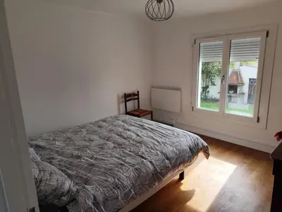 Un ou plusieurs lits dans un hébergement de l'établissement Appartement 6 personnes au calme à 25minutes de disney