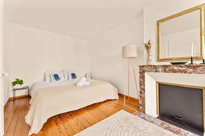 Un ou plusieurs lits dans un hébergement de l'établissement Champagne Escapade - Grand Duplex Hyper Centre