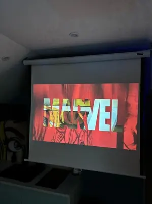 Télévision ou salle de divertissement dans l'établissement Game Over