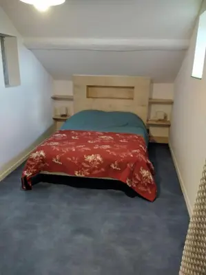 Un ou plusieurs lits dans un hébergement de l'établissement Gîte LE LOFT chez Judith et Neiges