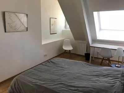 Un ou plusieurs lits dans un hébergement de l'établissement Le duplex de Talleyrand Hyper Centre