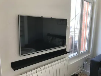 Télévision ou salle de divertissement dans l'établissement Le duplex de Talleyrand Hyper Centre
