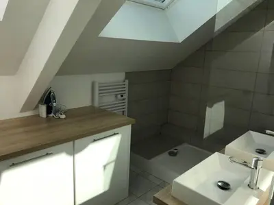 Salle de bains dans l'établissement Le duplex de Talleyrand Hyper Centre