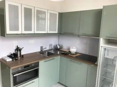 Cuisine ou kitchenette dans l'établissement Le duplex de Talleyrand Hyper Centre