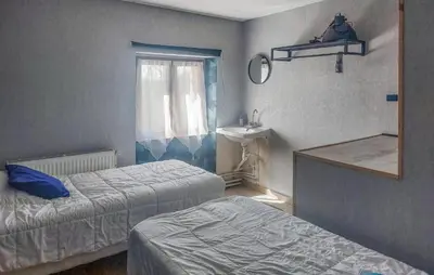 Un ou plusieurs lits dans un hébergement de l'établissement Beautiful Home In Maubert-Fontaine