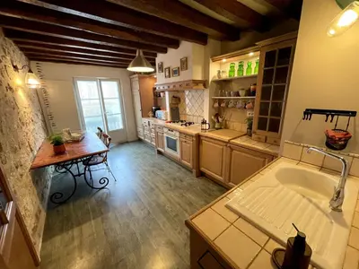 Cuisine ou kitchenette dans l'établissement Appartement entier 3 chambres hyper centre