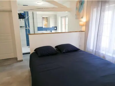 Un ou plusieurs lits dans un hébergement de l'établissement LaSweetHouseBleutée Tout confort