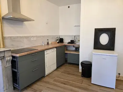 Cuisine ou kitchenette dans l'établissement La Glycine