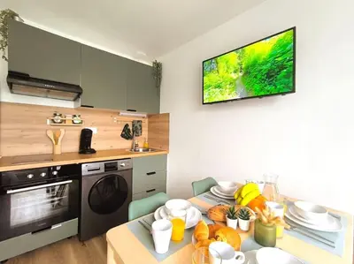 Cuisine ou kitchenette dans l'établissement NOUVEAU Les Grumes 2 - Maison - 2 chambres - Jardin - Neuf