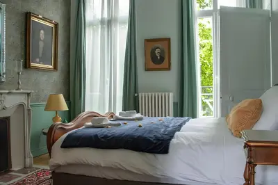 Un ou plusieurs lits dans un hébergement de l'établissement Appartement vintage - Reims centre