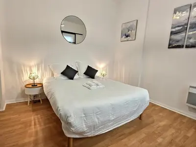 Un ou plusieurs lits dans un hébergement de l'établissement Superbe, T2 Spacieux 50m², Hypercentre, Neuf, RDC