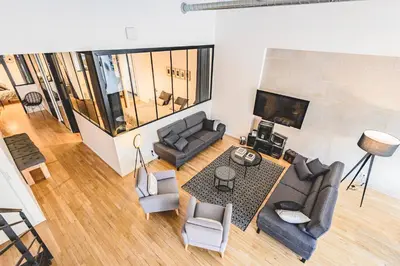 Coin salon dans l'établissement IKIZEN Prestige - Loft du Cadran - parking privé
