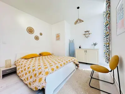 Un ou plusieurs lits dans un hébergement de l'établissement Appartement la Citadelle