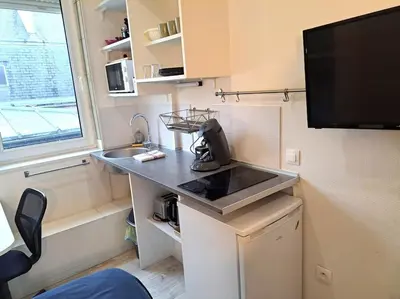 Cuisine ou kitchenette dans l'établissement Studette Vesle 4