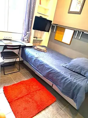 Un ou plusieurs lits dans un hébergement de l'établissement Studette Chabaud Rue