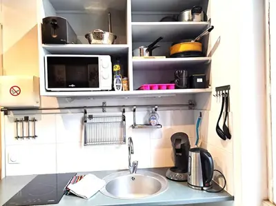 Cuisine ou kitchenette dans l'établissement Studette Chabaud Rue