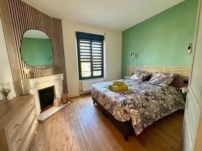 Un ou plusieurs lits dans un hébergement de l'établissement Gîte La Villa Marcelle