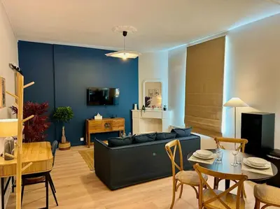 Coin salon dans l'établissement Relax Inn Champagne - Reims Balnéo