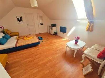 Un ou plusieurs lits dans un hébergement de l'établissement Belle chambre d'hôtes cosy proche Disneyland