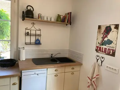 Cuisine ou kitchenette dans l'établissement Gite Les 3M