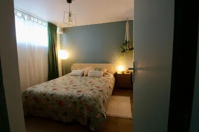 Un ou plusieurs lits dans un hébergement de l'établissement Le Rétro de la Gare - FloBNB