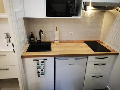 Cuisine ou kitchenette dans l'établissement Le 288 - Appartements Reimois