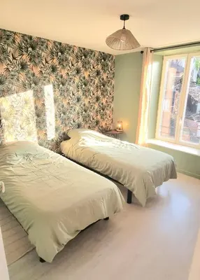 Un ou plusieurs lits dans un hébergement de l'établissement New appartement nature cœur de ville