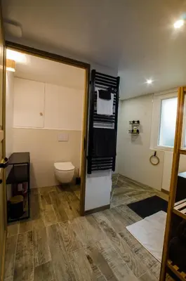 Salle de bains dans l'établissement Le Petit Candie