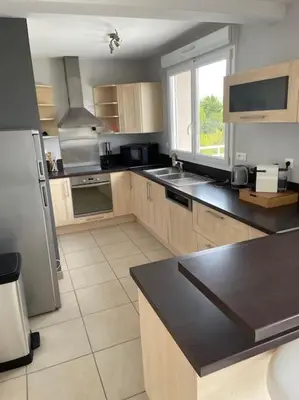Cuisine ou kitchenette dans l'établissement Maison d'hôtes