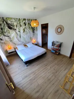 Un ou plusieurs lits dans un hébergement de l'établissement Logement en pleine nature à la campagne