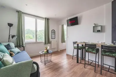 Télévision ou salle de divertissement dans l'établissement La rivière, appartement 3 personnes