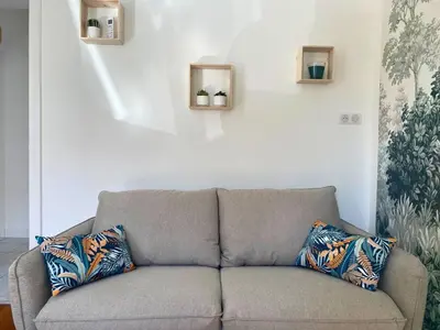 Coin salon dans l'établissement Vivez le confort moderne pour 4 personnes