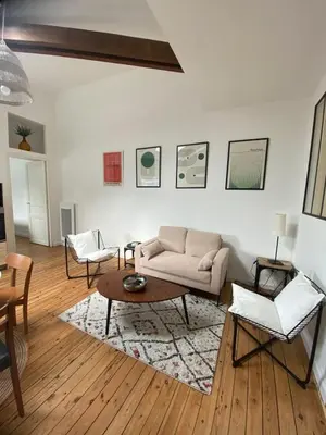 Coin salon dans l'établissement L'atelier- appartement 2 chambres