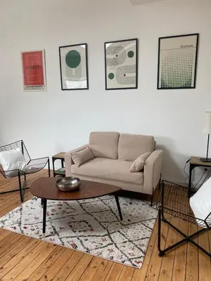 Coin salon dans l'établissement L'atelier- appartement 2 chambres