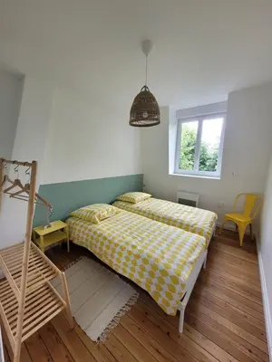 Un ou plusieurs lits dans un hébergement de l'établissement L'atelier- appartement 2 chambres