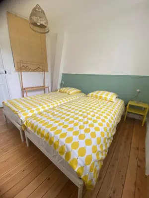 Un ou plusieurs lits dans un hébergement de l'établissement L'atelier- appartement 2 chambres