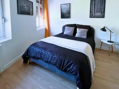 Un ou plusieurs lits dans un hébergement de l'établissement SQ Appartement - 2 Chambres - Proche Gare - Wi-Fi