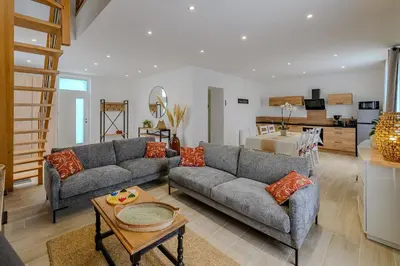 Coin salon dans l'établissement La Maissemiacoise - Belle Maison de campagne