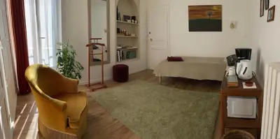 Télévision ou salle de divertissement dans l'établissement Suite - Chambre Cherry Plum