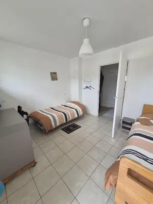 Un ou plusieurs lits dans un hébergement de l'établissement Motel le Bon Samaritain