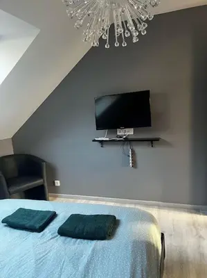 Télévision ou salle de divertissement dans l'établissement La Casa d'Alicia - Maison avec vue