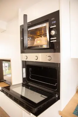 Cuisine ou kitchenette dans l'établissement Rez de Jardin - Calme & Familiale